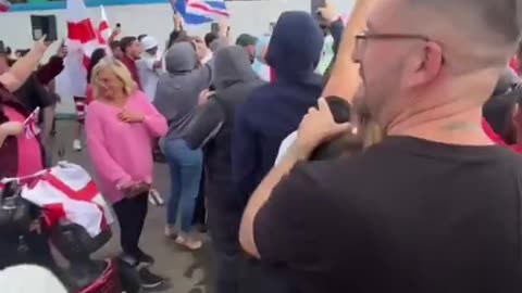 Many hotels in UK housing fake asylum seekers are surrounded by British patriots.