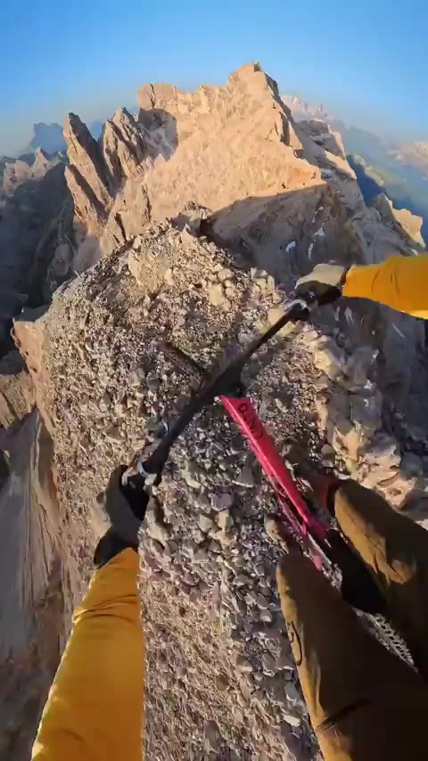 'Bike Peak' daring do, cyclist is clinically insane.