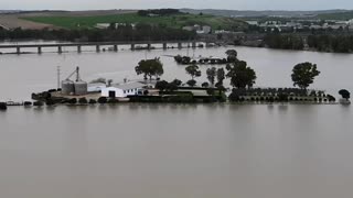 Drone shows riverbanks flooded in Spain's Andalusia region