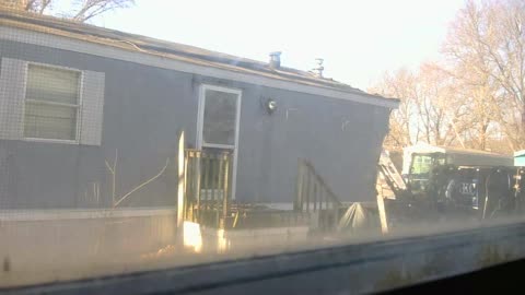 Demolition of the abandonded mobile home next door.