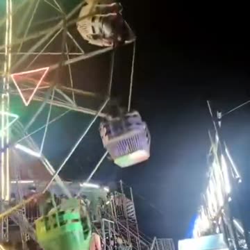 Riders fall out of malfunctioning ferris wheel in India!