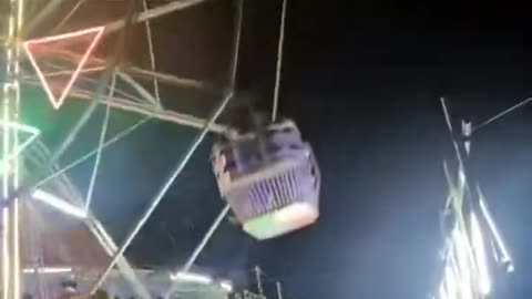 Riders fall out of malfunctioning ferris wheel in India!