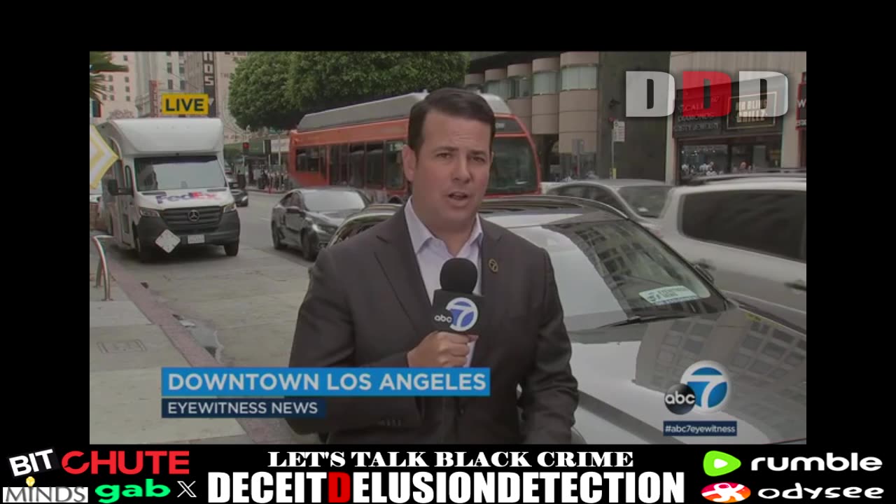 A group of black suspects on bikes in downtown LA violently attacked a white male driver