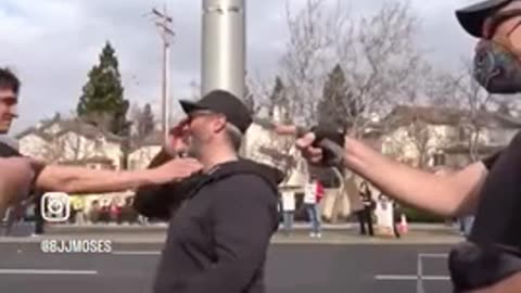 🔥 FIRE! Tough Guy Real Lucky he wasn't knocked out! (TESLA PROTEST)
