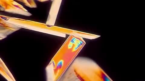 Epsom salt forming vibrant crystals under a microscope