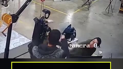 Moment humanoid robot attacks handlers as it tries to break free from restraints