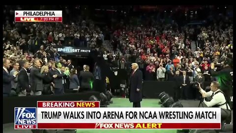 President Trump is welcomed to an NCAA wrestling match to a thunderous applause from the crowd