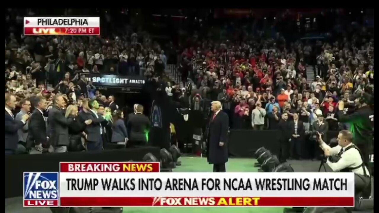 President Trump is welcomed to an NCAA wrestling match to a thunderous applause from the crowd