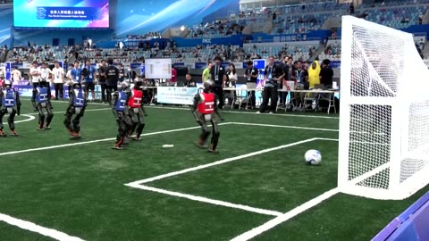 Humanoids crash, box, and race at China's 'robot Olympics'
			