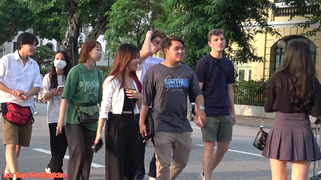 silent guy pulls odd gag around busy road hanoi