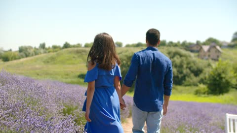 Enamored couple walking hand.