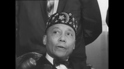ELIJAH MUHAMMAD SPEAKS TO PRESS DAY AFTER MALCOLM X'S ASSASSINATION - 1965