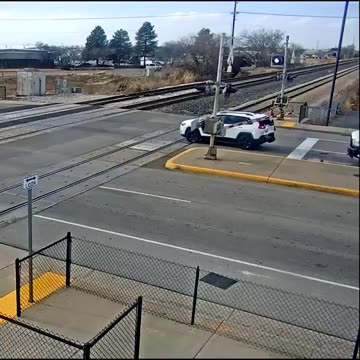 Impatient driver rear-ends car into train tracks
