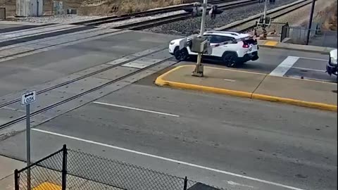 Impatient driver rear-ends car into train tracks