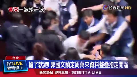 A member of Taiwan's parliament stole a bill and ran off with it to prevent it from being passed