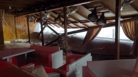A Wave Crashed Into A Beachfront Cafe In Adler, Russia