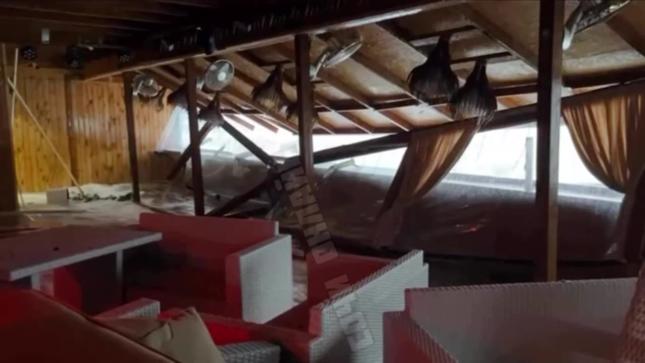 A Wave Crashed Into A Beachfront Cafe In Adler, Russia