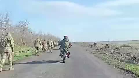 Russians Lead a Group of Prisoners of War to the Rear From Pokrovsk