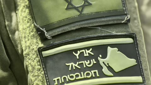 Emblemat na mundurach izraelskich żołnierzy ukazujący hegemoniczne plany Izraela
