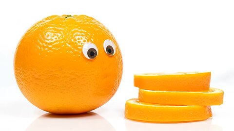 An orange eating orange slices