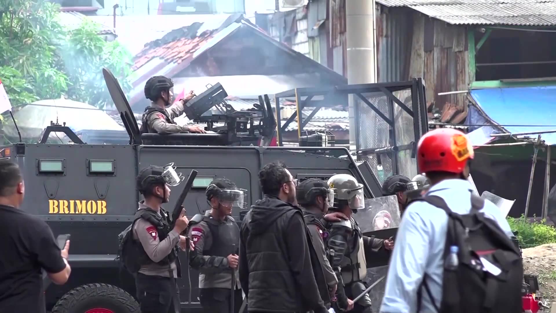 Indonesian police clash with protesters against MP salaries