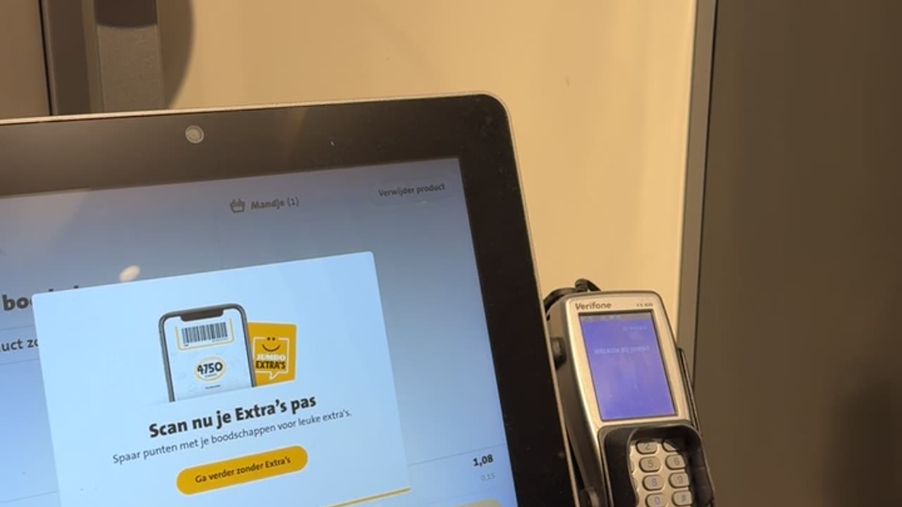 Cat Blocks Register At Supermarket Checkout