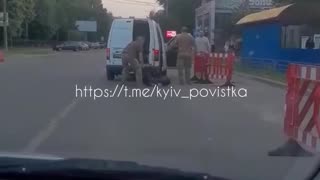 TCB Enforcers Load Ukrainian Man’s Body into Van Like Garbage in Brovary