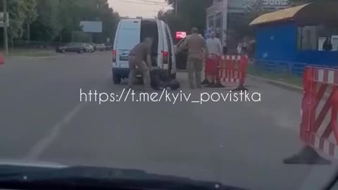 TCB Enforcers Load Ukrainian Man’s Body into Van Like Garbage in Brovary