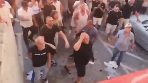 Chaos erupts as Israelis attack Arab-Isareli lawyer and member of the Israeli Knesset