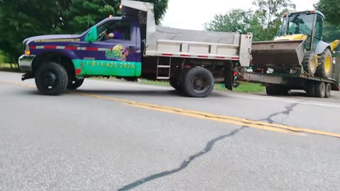 Hauling a new hallend Ford 555e backhoe