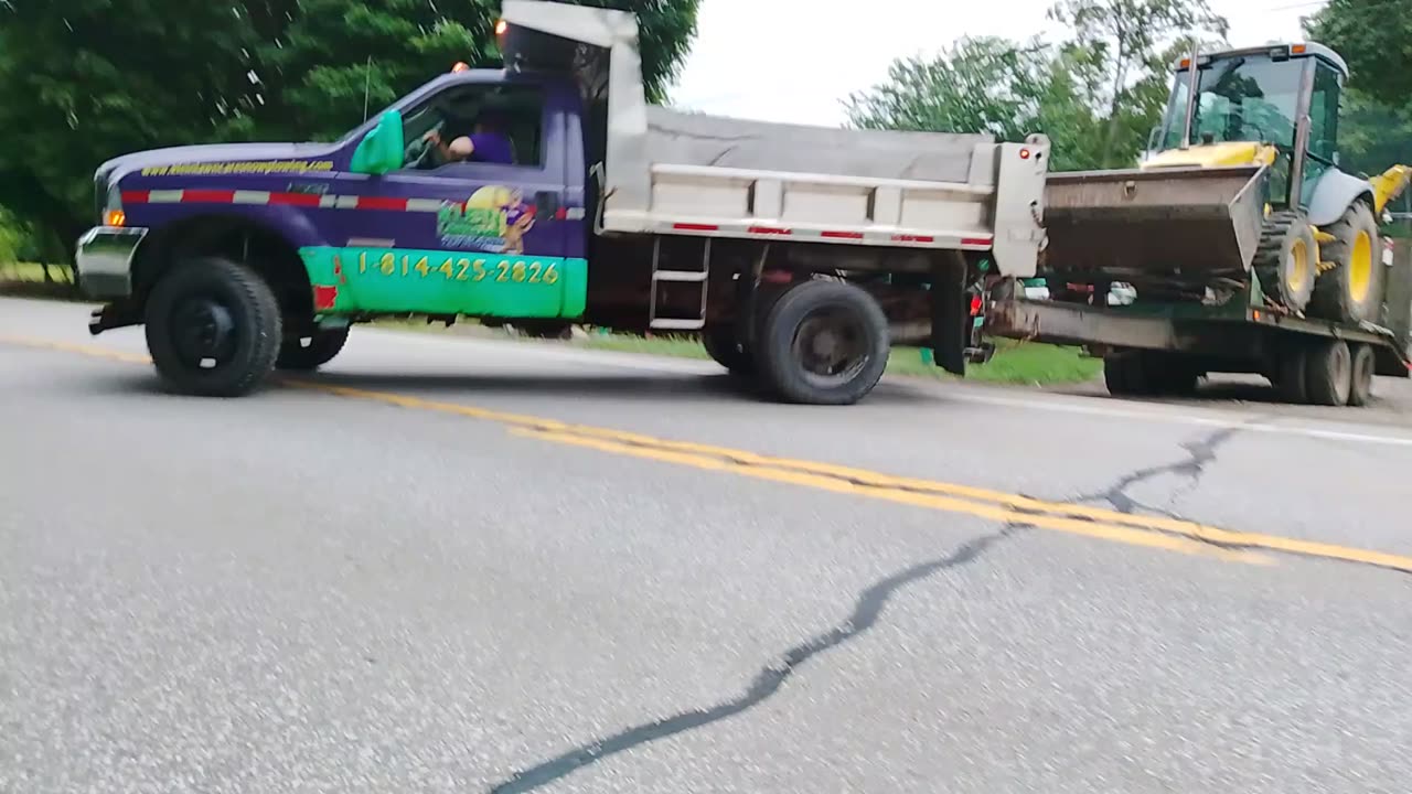 Hauling a new hallend Ford 555e backhoe