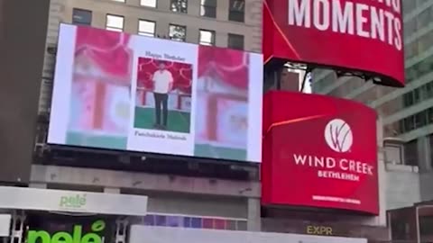 Charlie Kirk visits obese blk woman statue in New York