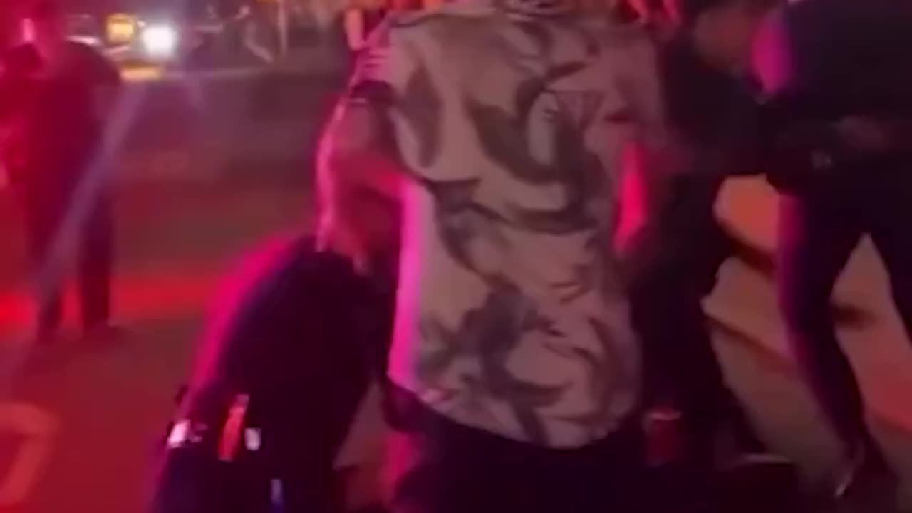 Santa Ana Police Officers Take Down Two People to Arrest Them Before a Guy Trucks an Officer