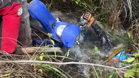 Motorcycle Falls Off Bridge Into Stream