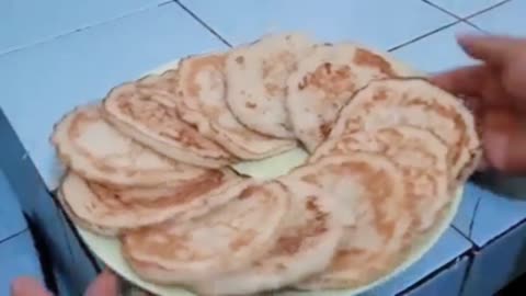 cook delicious panungkup cake, Traditional Indonesian food