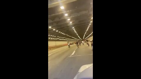 Joseph Martelli Niagara Falls, NY A bunch of people riding bikes & doing wheelies in a busy thruway