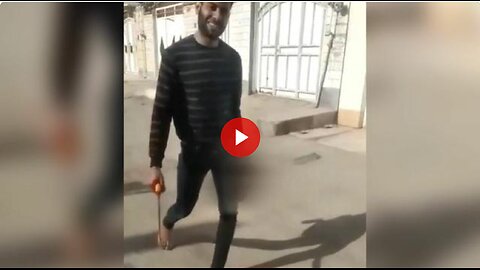 Divorce Iranian Style. Cuts wife's head off and walks around showing it off -story in description