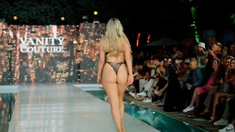 Jaw dropping leopard print swimsuit modeling