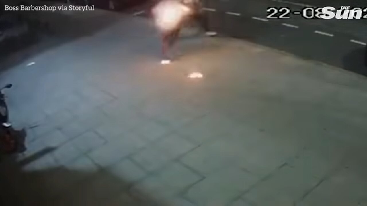 Horror moment huge blast rips through restaurant with man fleeing on FIRE as cops launch arson probe