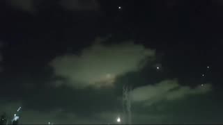 Air raid sirens and missiles seen exploding over Tel Aviv