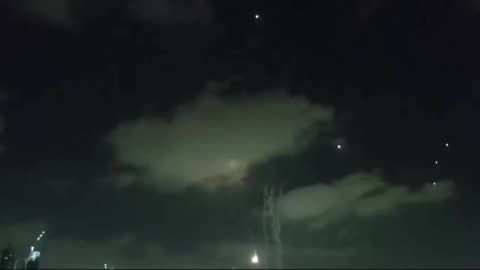 Air raid sirens and missiles seen exploding over Tel Aviv