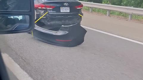 Bumper Hanging by a Rope on I-64