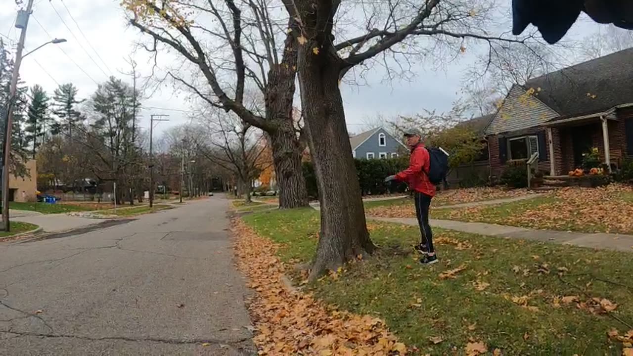 Nieighbot Steven Arbaugh tries to remove sign