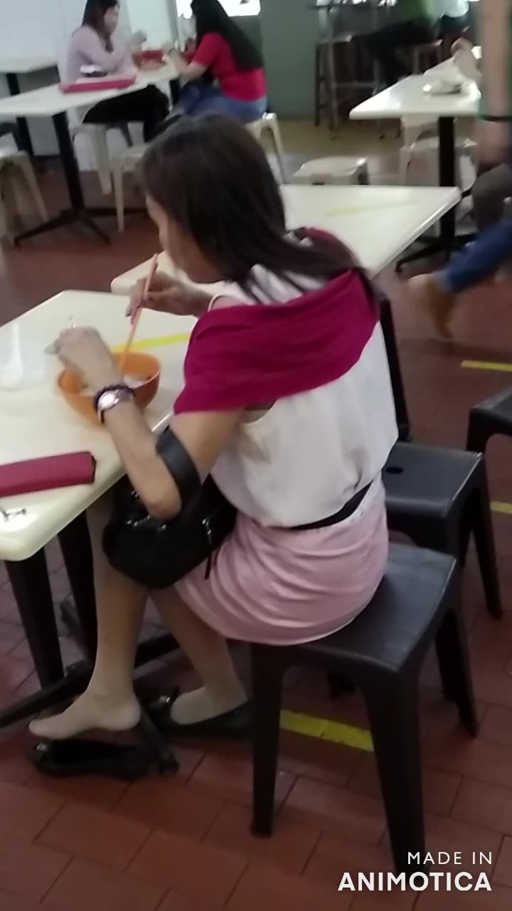 Having her lunch...