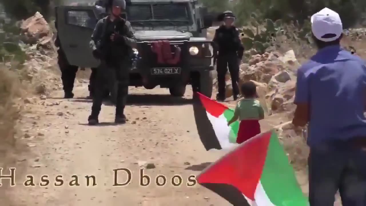 Palestinian father tries to get IDF to shoot his son on film, troops shake his hand