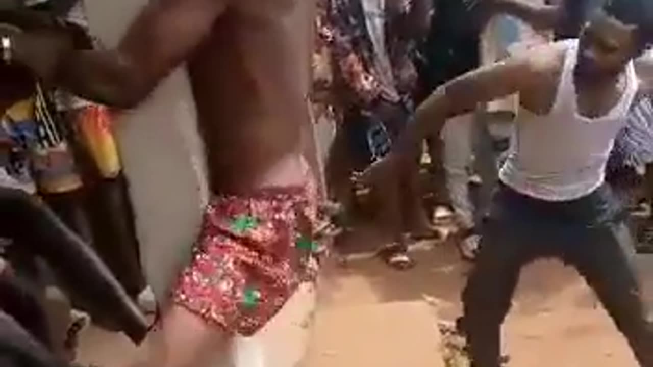 African nigger being whipped