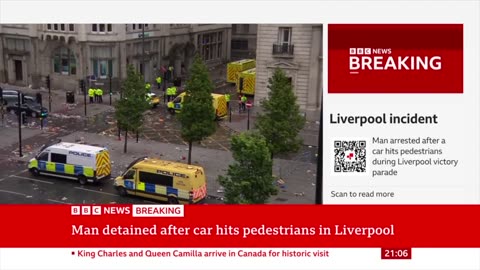 Man arrested after car hits pedestrians at Liverpool FC Premier League title parade | BBC News