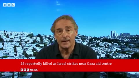 Gaza rescuers say at least 26 people killed after Israeli tanks open fire near aid centre | BBC News