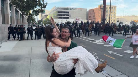 Proposal in Front of Riot Line — LAPD Watches as She Says Yes!