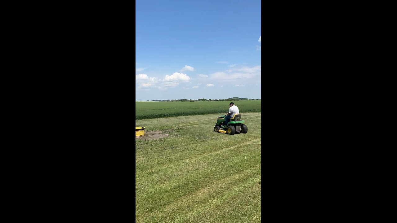 tim mowing his lawn
